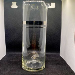 Mid-century modern martini/cocktail pitcher with silver stripes. Good condition.